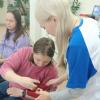 <img src='img' alt='Волонтер' />